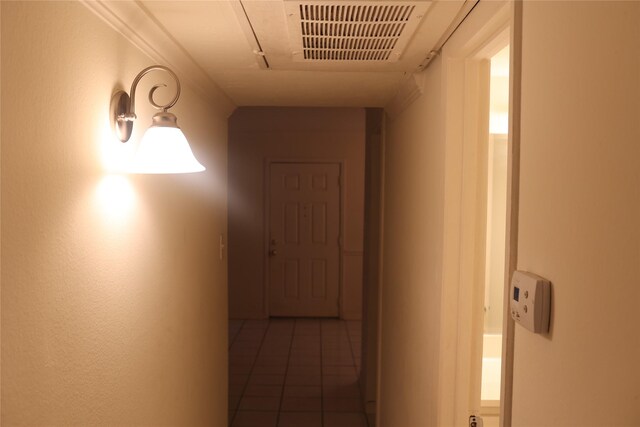 hall featuring tile patterned flooring