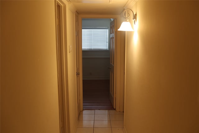 corridor with light tile patterned floors