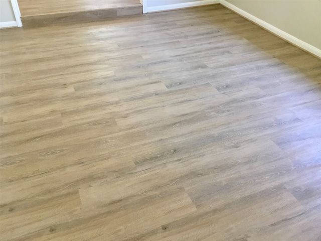 details with hardwood / wood-style flooring