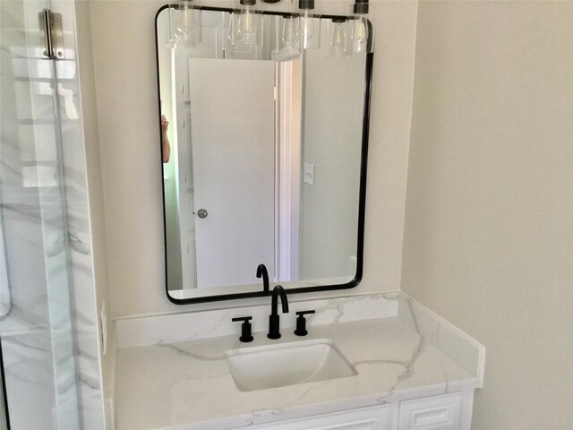 bathroom with vanity and a shower with curtain