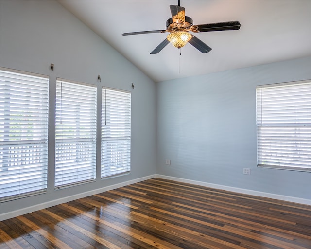 empty room featuring high vaulted ceiling, ceiling fan, and dark hardwood / wood-style flooring