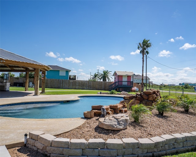 view of pool with a patio and a gazebo