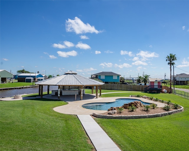 surrounding community with a water view, a lawn, a pool, and a gazebo