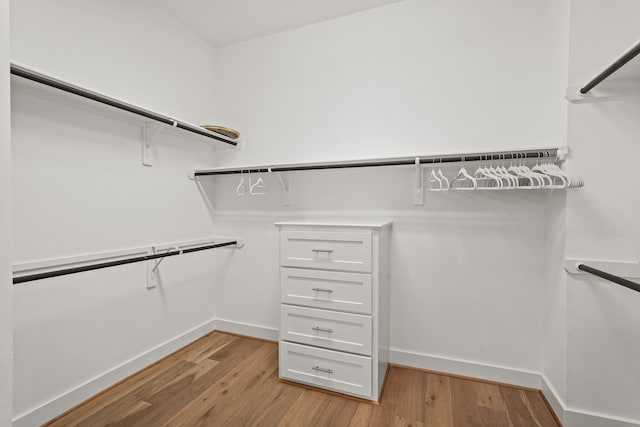 walk in closet featuring light wood-type flooring