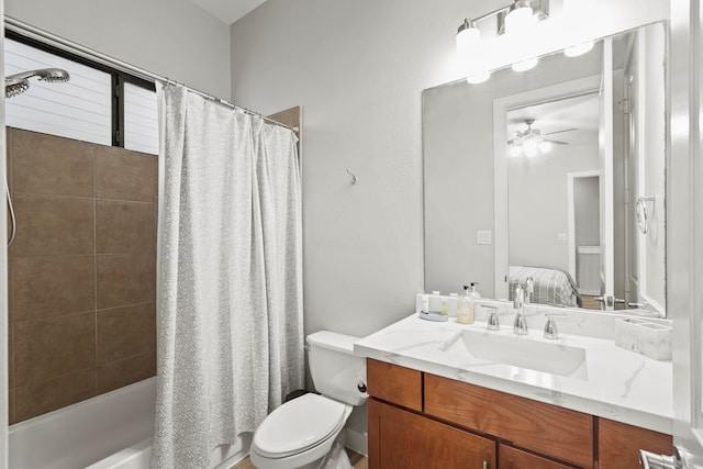 full bathroom with shower / bathtub combination with curtain, ceiling fan, toilet, and vanity