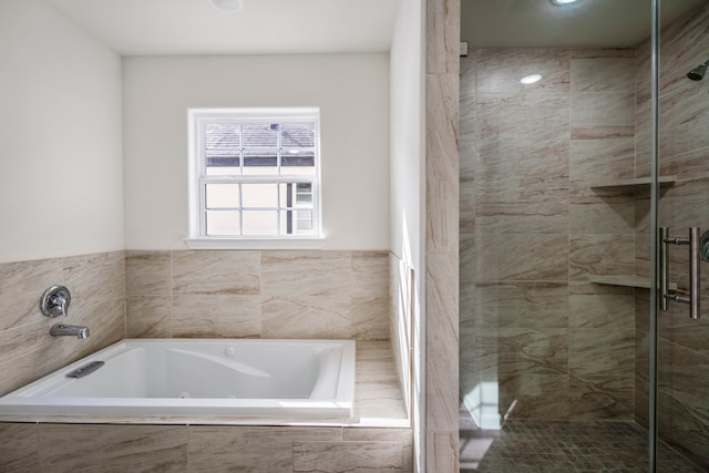 bathroom with independent shower and bath