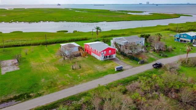 bird's eye view with a rural view and a water view