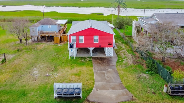 drone / aerial view with a water view