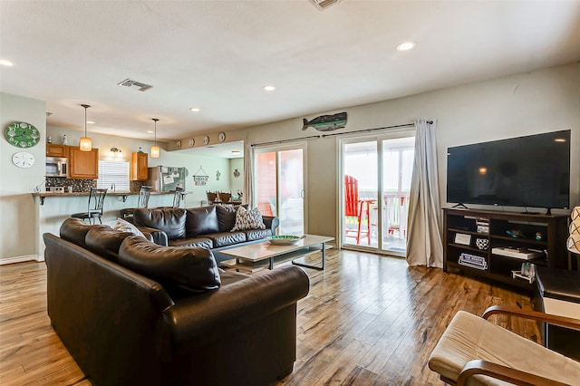 living room featuring light hardwood / wood-style floors