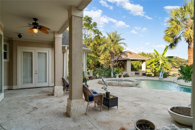 view of pool featuring a patio, a gazebo, and ceiling fan