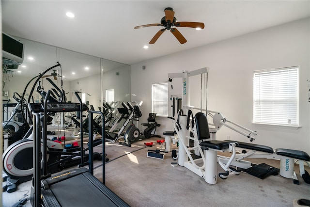 gym with carpet and ceiling fan