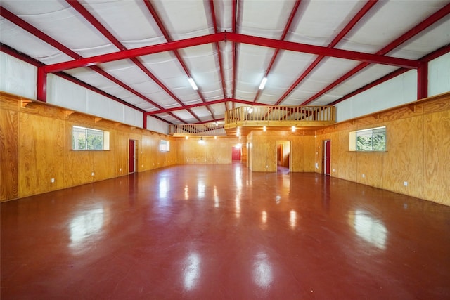 garage featuring wooden walls