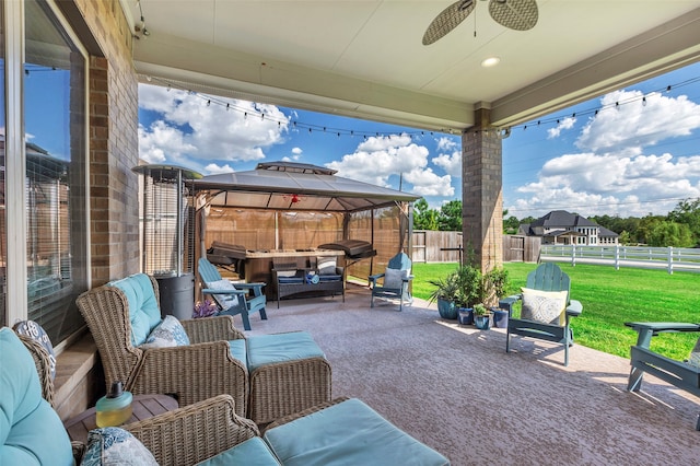 view of patio / terrace featuring an outdoor hangout area and a gazebo