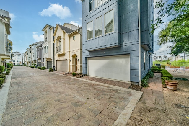 exterior space with a garage