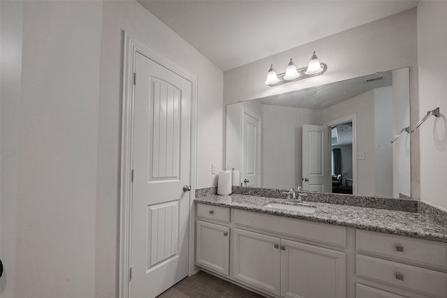 bathroom featuring vanity and tile patterned floors