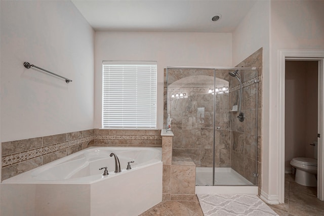 bathroom with toilet and independent shower and bath