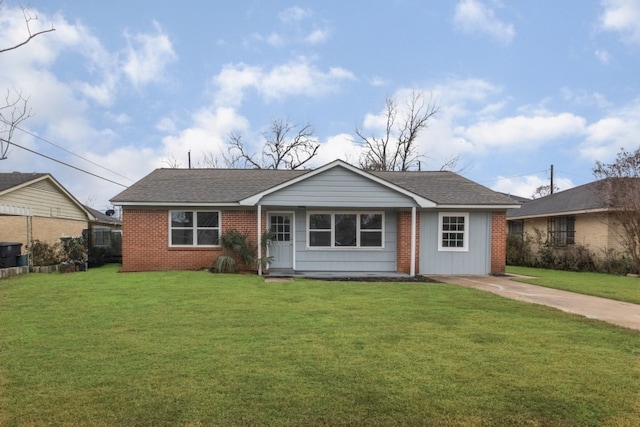 ranch-style home featuring a front yard