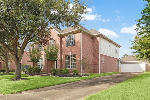 view of front of house featuring a garage and a front lawn