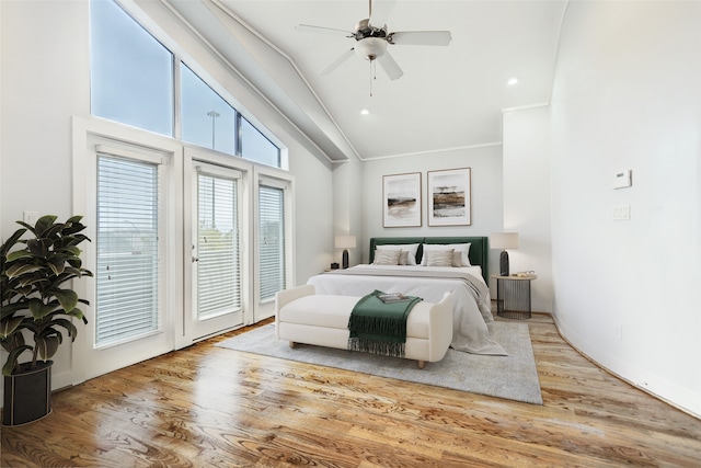 bedroom featuring access to exterior, ceiling fan, high vaulted ceiling, and light wood-type flooring