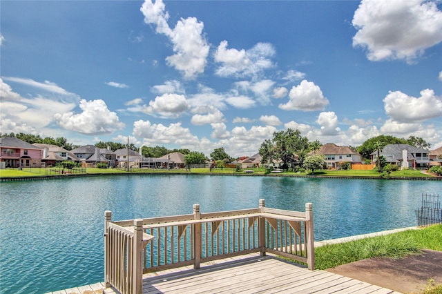 dock area with a deck with water view