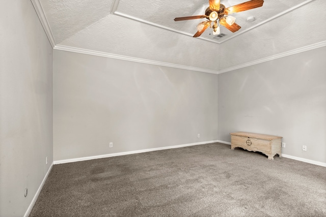 carpeted spare room featuring lofted ceiling, crown molding, ceiling fan, and a textured ceiling