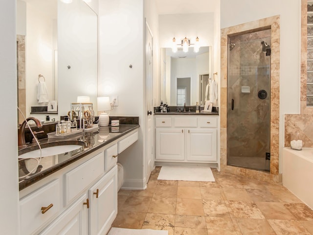 bathroom with shower with separate bathtub and vanity