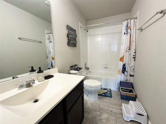 full bathroom with vanity, toilet, and shower / bath combo