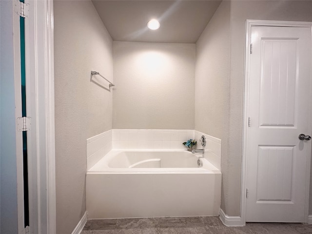 bathroom with a tub