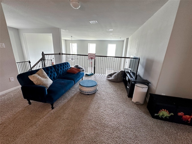 living area featuring carpet floors