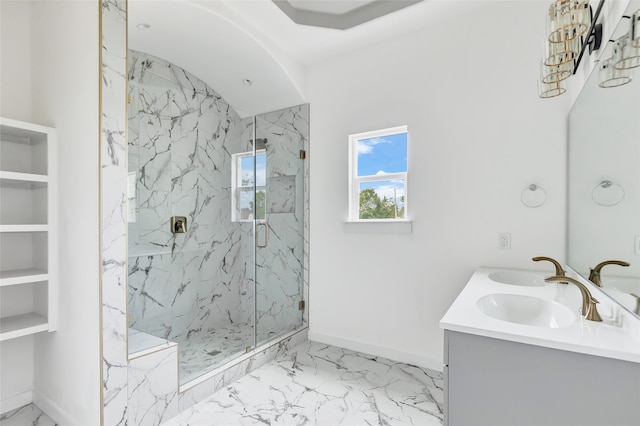 bathroom featuring vanity and a shower with shower door