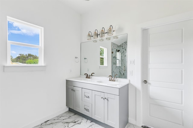 bathroom featuring vanity and a shower with shower door