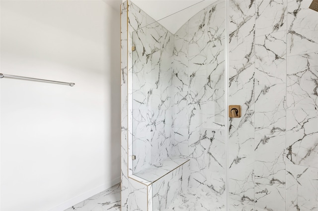 bathroom featuring tiled shower