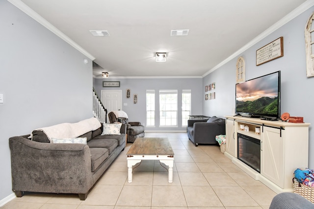 living room featuring crown molding and light tile patterned floors