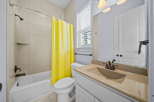 full bathroom featuring vanity, shower / tub combo, toilet, and tile patterned flooring