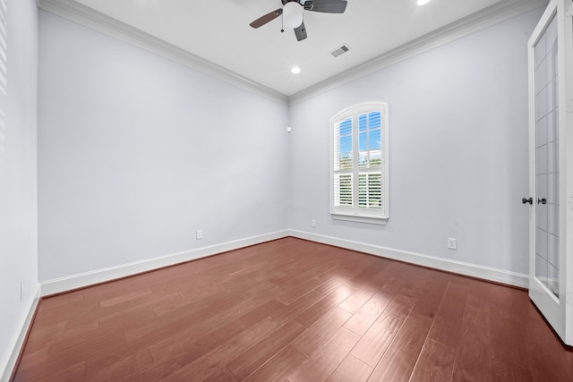 spare room with ornamental molding, hardwood / wood-style flooring, and ceiling fan