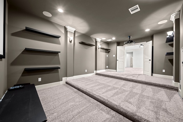 interior space with ornate columns and carpet flooring