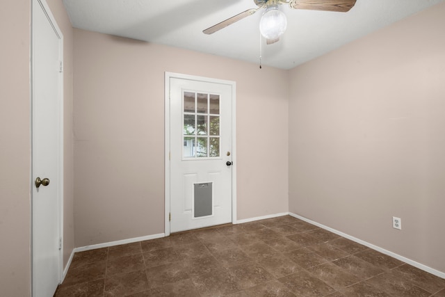 spare room featuring ceiling fan