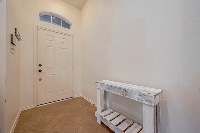 foyer with light tile patterned floors