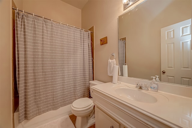 full bathroom featuring toilet, shower / tub combo with curtain, and vanity