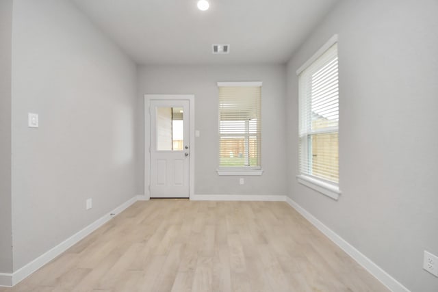 entrance foyer with light hardwood / wood-style flooring