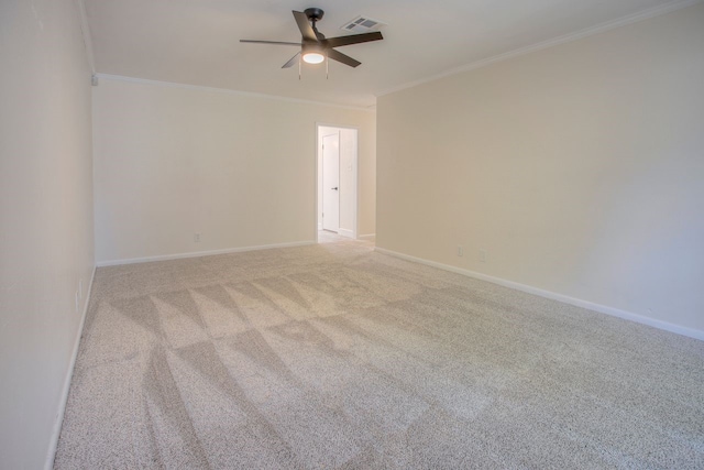 unfurnished room with light carpet, baseboards, visible vents, a ceiling fan, and ornamental molding