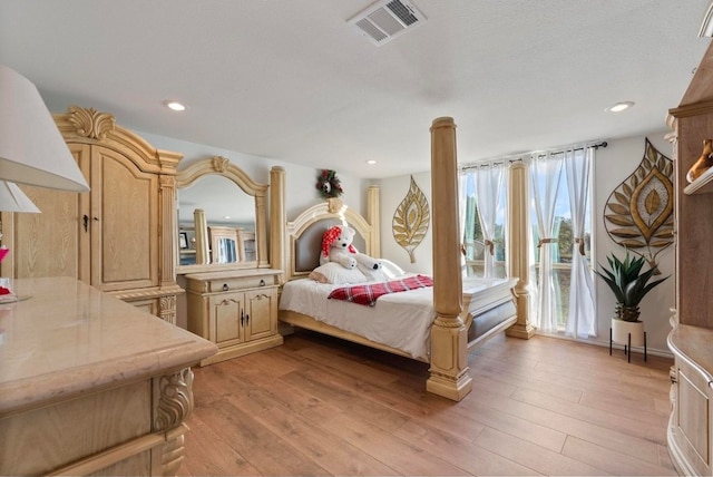 bedroom featuring light wood-type flooring