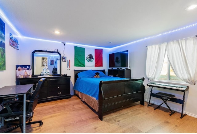 bedroom featuring light hardwood / wood-style floors