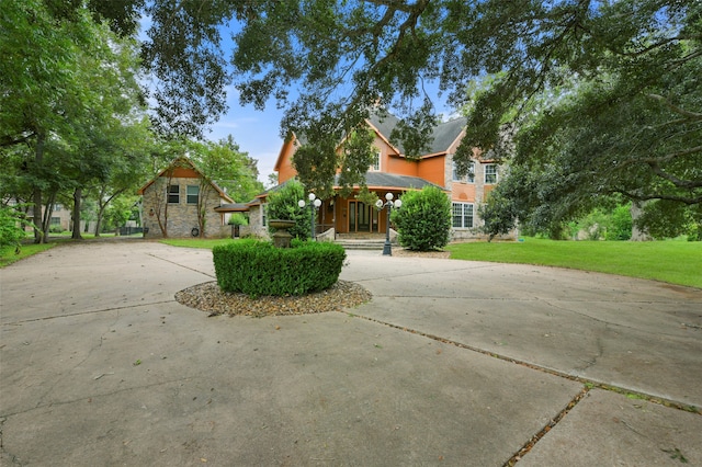 view of front of home with a front yard