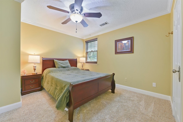 carpeted bedroom featuring a textured ceiling, crown molding, and ceiling fan