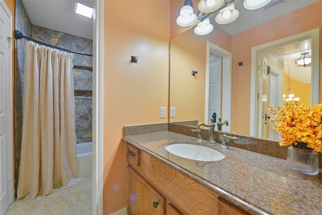 bathroom featuring shower / bath combination with curtain and vanity