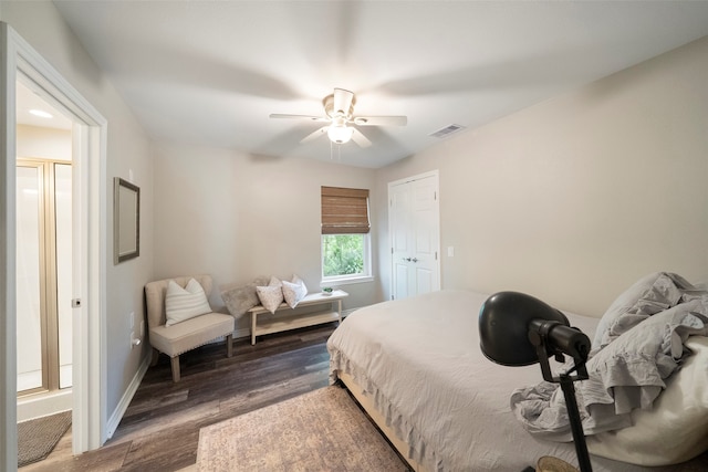 bedroom featuring ceiling fan and dark hardwood / wood-style floors