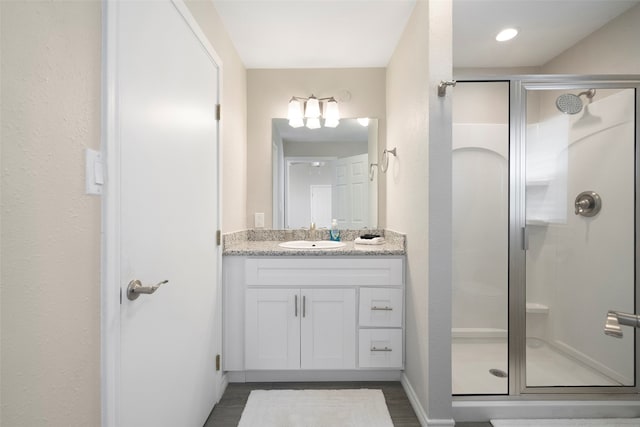 bathroom featuring vanity and walk in shower