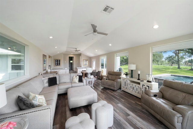 living room with vaulted ceiling, dark hardwood / wood-style floors, and ceiling fan