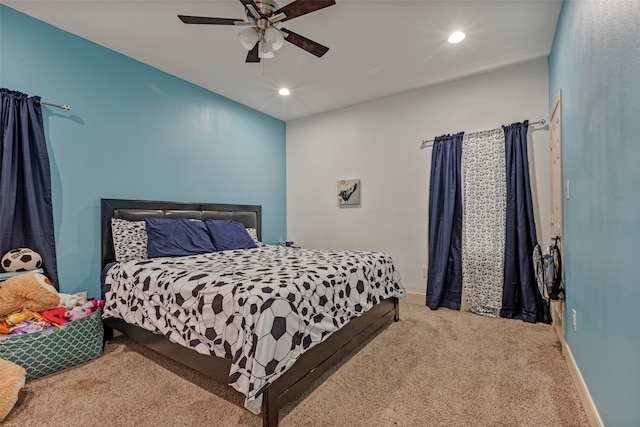 bedroom featuring ceiling fan and carpet floors